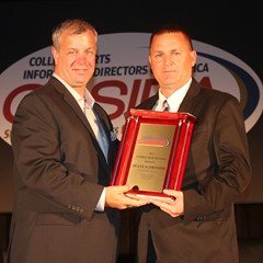Darren Miller (Iowa) accepted a CoSIDA Hall of Fame award on behalf of Duane Schroeder (Wartburg).